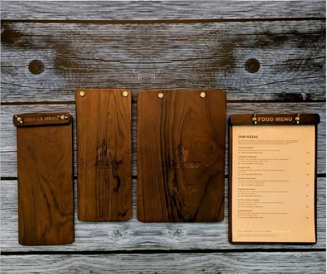 Handcrafted wooden menu boards and clip menus for a cafe bar, engraved and finished in warm wood tones